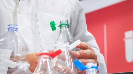 A picture containing person, drink, drinking water, plasticDescription automatically generated